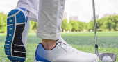 Why do pro golfers wear white shoes?